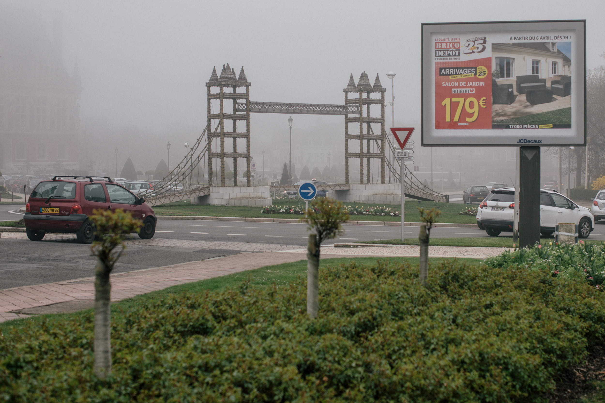 A moped hand-painted with the Union Jack flag, and the model of Tower Bridge on the roundabout outside City Hall. Photographs: Rob Pinney for Point.51